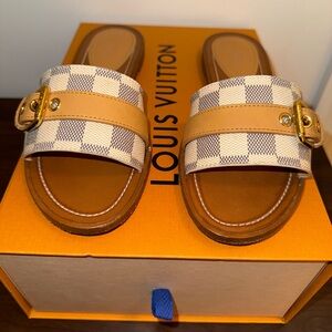 Louis Vuitton Lock It Flat Mule